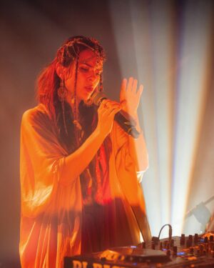 Ruby Chase O'Neil Instagram - It’s a PARADOX .. A mystery ✨
I am  s u r r e n d e r 
And the victory 🌙

Deep gratitude for all the love on PARADOX 🔥
This is by far the most love I’ve ever felt on a release :) it feels so potent to feel you all moving with the music 

@lsdream you are pure heart. It’s such an honor to be walking next to you with this beauty brewing and to get to know the incredible human behind the music :) 

So excited for the other goodies brewing for u …
🎶⭐️🤍

📷 @carlossalasg.14 
Blessing my beautiful performers for this show @fannyfenix__ @kalidance_ ❤️🌹❤️
@maefestcr