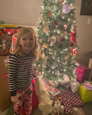 Rylea Nevaeh Whittet Instagram - Merry Christmas 🎄 check out that Netflix ribbon 🎀 #merrychristmas #christmas #christmas2021 #ryleawhittet #ryleanevaehwhittet #maddyfrommaid #netflix @netflix #smileyrylea #smile #blueeyes #reddress #christmasnails #christmasdress