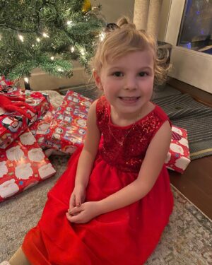 Rylea Nevaeh Whittet Instagram - Merry Christmas 🎄 check out that Netflix ribbon 🎀 #merrychristmas #christmas #christmas2021 #ryleawhittet #ryleanevaehwhittet #maddyfrommaid #netflix @netflix #smileyrylea #smile #blueeyes #reddress #christmasnails #christmasdress