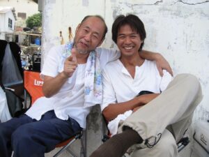 Saburo Tokito Instagram - #Drコトー診療所 (2003年)の与那国島ロケ現場オフショット@久部良　オレはだいぶ老けたけど、泉谷さんは現在とほとんど変わらない！

フジテレビ系列各局で再放送中
TVer・FOD・GYAO! でも配信中

映画「Dr.コトー診療所」12月16日（金）公開
 #泉谷しげる #時任三郎