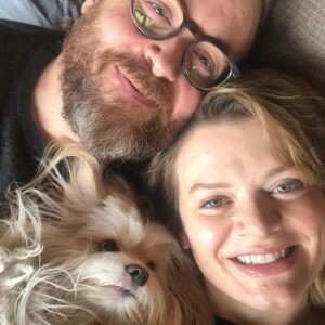 Sam Reich Instagram - Today we lost our beloved dog Finnegan to cancer. He was 7 years old. 

Finn was rescued by @maedayrescue along with 3 other pups and their mom from a parking lot in Tarzana. He was, to us, less of a dog and more of a little boy. He was sweet, watchful, and affectionate, but also rambunctious, independent, and opinionated. We never learned his breed, but we suspect he was largely Lhasa Apso, who the Tibetan monks had guard their holy temples. His favorite things were balls and cheese, and his least favorite things were children and water.

Finn was whip smart and learned 15  tricks in his short life: “sit,” “stay,” “roll over,” “speak,” “stand up” and more. He also learned things we never meant for him to: "where's your mom" and "where's your dad" would send him searching for either one of us; "go see who it is" would heave him howling toward the door. 

He would ask for pets by propping himself up on your knee and then petting himself, pawing at his own face. He would go upside-down for belly-rubs, and then - if you stopped - go somehow *further* upside-down, making himself irresistible. He would ask to play ball by dropping it repeatedly at your feet ad infinitum. And, if your face was in reach, he would launch himself at you and cover you in kisses.

His long hair was the talk of the neighborhood. When we dyed his tail rainbow colors for pride, he earned the local nickname "rainbow dog." When he ran - at a top speed pretty impressive for 13 pounds - his hair would be one step behind him, creating a sort of antigravity effect. When he was bathed by the wonderful team at @jessronagrooming, he would suddenly look as small and fragile as he really was.

I'll miss the "ka-thunk, ka-thunk, ka-thunk" of him coming down the stairs. I'll miss the way he'd nonchalantly bark at the door for hours, like a percolating pot of coffee. I'll miss the way he unfolded his entire body to pee, like a ballerina. I'll miss him sunbathing on the deck in the morning, wearing squinty eyes and a deadpan expression. And I'll miss his holy presence in our lives. Dog backwards and all that.

Love you forever, little man.
