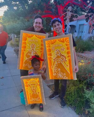 Sam Tsui Instagram - Welcome to the Family Madrigal! For our annual DIY #halloween costume extravaganza, we transformed into the enchanted casita doors from Elaia’s beloved #encanto - I wonder what we’ll do next year…. #diyhalloween #halloweencostume #encantodisney