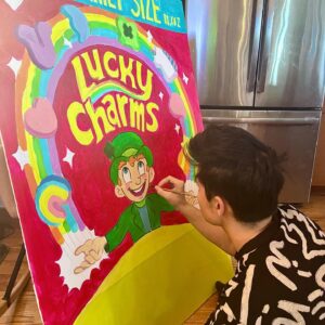 Sam Tsui Instagram - 🍀❤️lucky charms💫🎈
Excited to bring back the epic group costume with @caseybreves @yzinkow and @mollyshoffman84 now featuring our beautiful babies as the littlest charms!! It was an epic second Halloween for Elaia - this time she actually got to get out of the wagon and trick-or-treat a bit herself! So happy to get to share our tradition of ambitious, ungainly, and impractical cardboard Halloween costumes with our kids!! #halloween #halloweencostume #luckycharms #halloween2022