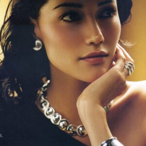 Sandrine Holt Instagram - Throw back to this old jewelry ad for #birks #retouchmuch.... in the old days they didn’t like pores or your actual nose.