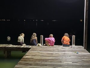 Sarah Dessen Instagram - It's our last night at the lake tonight. Every year, I look forward to these handful of days so much, full of laughter and music and stories. This has been a year of so much change, but thankfully---and I am so thankful!---some things do stay the same. Today the ice cream truck came and I made a cardboard dollhouse with some of the most imaginative kids ever. And the summer is only just starting! Here's to days ahead of peace and fun (remember those?) for everyone. It's like the beginning of a novel. Who knows what can happen?