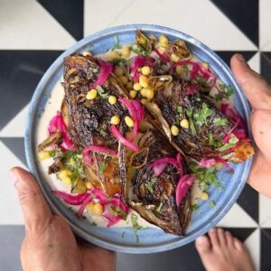 Saransh Goila Instagram - Ever had Patta Gobhi like this? Before anyone says yeh toh kachi lag Rahi hai it cooks to perfection and melts in your mouth. Also it's super smoky and well charred which gives the sweet cabbage 🥬 a great well defined roasted flavour with mild bitterness. This has to be one of the most fun ways of making cabbage the star ⭐ on a plate. 
.
.
1 Cabbage 
Cut into quarters 
Heat 1 tbsp Mustard oil 
Place the cabbage and roast
Cover & cook for 6 to 8 minutes 
Look at that 😮‍💨😍😮‍💨

Cut a chili 😎
Crush 1 pod of roasted garlic 
A handful of mint and coriander
1 tbsp Ginger garlic paste 
1/2 tsp Coriander powder 
1/2 tsp Garam masala powder 
Salt to taste 
1/2 tsp Black pepper powder 
2 tbsp Balsamic Vinegar 
Juice of 1/2 a lemon
3 tbsp Olive oil 
Mix everything 
Look at that 🤤
Pour the sauce generously onto the cabbage
Cook it from all the sides 
Mix leftover sauce with 1 cup thick yogurt 
Spread yogurt onto a plate
Place the cabbage 
Garnish with pickled onions 
Boondi & coriander 🤤🔥
Delishaaas 🔥🔥🔥