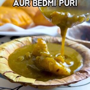Saransh Goila Instagram - My take on Mathura ke special Dubki Wale Aloo and Bedmi. There are different ways of making this classic but this is my favourite style for sure and I like to add mint and dhaniya to that little palak paste we make to get that chatpata green colour! Waise toh Mathura ka peda, lassi and chaat all is Delishaaas but these potatoes just hit different and are very nostalgic for me :) 

Bedmi puri aur Dubki wale aloo 

1/2 bunch Spinach leaves 
A handful of Fresh coriander 
A handful of Fresh mint (optional)
2 Green chilies
1 inch Ginger 
1/2 tbsp Kasuri methi 
1/2 inch Cinnamon stick 
2 Cloves 
2 Green cardamom 
1 Black cardamom 
A few black peppercorns 
Blend everything well 

1 tbsp Mustard seeds 
A pinch of Hing 
1 tsp Jeera 
1 tsp Saunf 
2 tsp Red chili powder 
1/2 tsp Haldi powder 
2 tsp Coriander powder 
Mix everything well 
Add the paste 
Mix well 
Shake the blender jar with some water 
Add everything in
Mix well & cook for 10 minutes 
200g Potatoes, boiled 
Mix well 
Add 2 cups water 
Mix well 
& bring to a boil 
Cover & cook for 15 minutes on low flame 
Add of tadka ghee, dried chilies, jeera & hing 
Mix well 
Add aamchur to taste 
Anardana powder to taste 
Mix well 

For the bedmi puri 

2 cups Whole wheat flour 
Salt to taste 
1 tsp Ajwain 
2 tbsp Ghee 
Mix everything well 
Add water little by little 
& form a semi stiff dough 

For the filling 

Roast 1 cup Urad dal 
till golden brown 
Blend into a coarse powder 
1 tbsp Mustard oil 
A pinch of hing 
1 tsp Red chili powder 
1/2 tsp Haldi powder 
1 tsp Dhaniya powder 
1 tsp Jeera 
1 tsp Saunf 
Roasted dal powder 
Mix well 
Add 1/4 cup water 
Salt to taste 
Mix well & cook till all the water is absorbed 
Once cooled the mixture will become 
crumbly 
Portion out the dal filling 
Stuff it in the atta 
Roll it as desired 
Fry till golden brown and puffy 
Serve with the aloo 

Delishaaas 😮‍💨🤤🔥