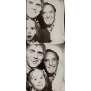 Sasha Sagan Instagram - My mother sent me this a few days ago. She found it while sorting through some things. I can’t stop looking at it. In part because my daughter is now about the age I am here. I keep finding her face in mine. If you read my book you know I love and miss the two gentlemen in this photo, my dad and my Grandpa Harry, very much. (And also that I feel rather strongly about photo booths.) So #stayhome and maybe find some lost treasures.