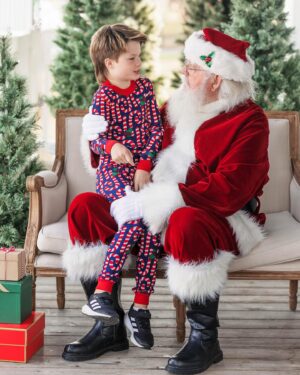 Shandi Finnessey Instagram - I’m obsessed with our Santa pics this year. He spent so much time with each boy… asking how their year was, if they’re liking school, what they want for Christmas (Bodhi and Finn said “time machines” so yeah, good luck with that one, Santa). Christmas time is  just pure magic! Nothing quite like seeing the holidays through the eyes of a child.