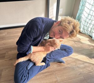 Shane Madej Instagram - I forgot about this photo @saraerubin took of me and the cat that lives here with us