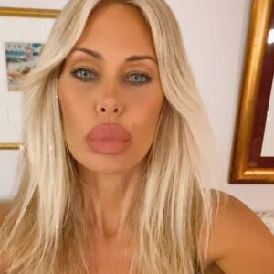 Shauna Sand Instagram - Bangs...leopard catsuits...black stilettos...