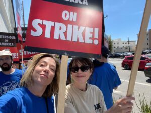 Siân Heder Instagram - We’re on strike. Writers are the driving force behind film and television. We are responsible for creating, writing and producing more than 4,000 episodes of scripted programming and hundreds of films each year. We are asking for less than 2% of the Hollywood profits these massive corporations make off our work. And yes that means I’m picketing in a boot with a broken foot. #wgastrong