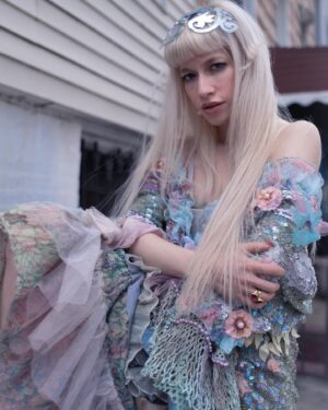 Sideara St. Claire Instagram - This @desertstarsvintage NFS legit fairy cardigan changed my life I don’t think I’ve been the same since I wore it LOOK AT IT!!!! 😔💕 Paired perfectly with this @shopsideara cap from the x @belllapietro collection (one of my top favs) and my @melissaofficial @yproject_official shoes that I pretend fit perfect, shot by the angel @alyssa_tiffany and styling with bb @josienolann 🪭❣️