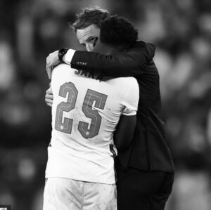 Sonya Walger Instagram - In all honesty, a week ago I couldn’t have told you who either of these men were. And this morning I woke up both broken hearted and so proud of those boys. This hug says everything I want to teach my kids about trying your best and failing and loving the effort not the result, about empathy and rising and falling together, not alone. I am still hoarse from yelling at a telly by the ocean, still English despite not being able to tell you who plays what, still homesick after all these years.