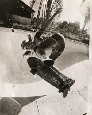 Stacy Peralta Instagram - Another very rare board from my collection and the story behind it: Right after the collapse of the Zephyr team and months before getting sponsored by Gordon&Smith I was sponsor-less, as were many Z Boys at that time.  Bob Biniak had just hooked up with Sims and said to me one day; “You need to get off your Zephyr board, you need a board with a kick-tail for the pools we’re riding.  He then handed me a flat wooden Sims board and said; “Go home to your kitchen, boil a pot of water like you’re gonna make spaghetti, drop the tail in the pot and boil it over night.  In the morning take the board into your garage, clamp it from the middle into a vice, tie a piece of rope around the tail, pull the rope as hard as you can until the tail bends and then tie the rope to a hook in the wall.  Let it sit for a week.  After that you’ll have a board with a kick-tail.  I did exactly as Bob said; I dropped the board into a pot and boiled it overnight.  Next I clamped it into a vice, pulled back the tail and tied it to a wall.  A week later, I untied it, opened the vice and there it was, a board with, if not an actual angled kick-tail, a tail with a really strong and effective warp.  I mounted it with Bennett Trucks and Sims Pure Juice Wheels. Later that day we got word of a new pool way out at the far end of the San Fernando Valley in an area of old farm houses and orange groves.  We were told a 90 year old woman lived on the property but she was hard of hearing so sneaking in wasn’t a problem. Biniak, Alva and I drove out in my VW Squareback, found the place, hopped the fence and encountered what I still consider today to be the best backyard pool I’ve ever ridden.  We called it the Devonshire Pool because it was the Devonshire exit off the 405 freeway.  That Sims board rode incredibly well and was a huge step up from my Zephyr and the tail worked just as Biniak had said.  Shortly thereafter Gordon&Smith came to me with a great offer.  At my contract signing Larry Gordon asked me what I’d like to call my new skateboard model, to which I replied; “Why don’t we call it the Warptail?”