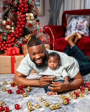 Stan Nze Instagram - May the joy of this season never depart from your household. Merry Christmas 🎄

with ❤️ from The Nzes 

PJs by @kwuchiz_stitches 
Tree by @surprisecore 
Photographed by @thomfelix_concept 

#MerryChristmas #TheNzes #Jaybobo #Ngozichierika
