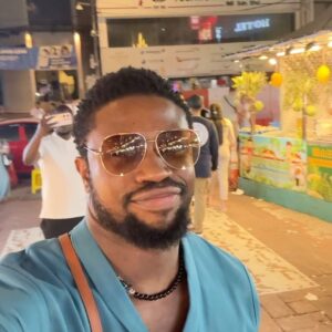 Stan Nze Instagram - ÁFÀMÉFÙNÀ 🤓 The joy in my heart ❤️ 

Some more sights and sounds from the streets of Kuala Lumpur 💐

Outfit by @amdiddyy 
Slippers by @bants_foots 

#Afamefuna #BestActor #Ngozichierika #Grace
