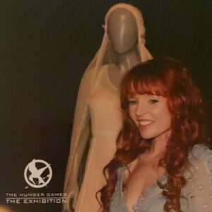 Stef Dawson Instagram - Just found this photo @thehungergames exhibition Australia with Annie Cresta’s Wedding Dress, designed by the incredible dream team @kurtandbart 💙
#thehungergamesexhibition 2016 #thehungergames