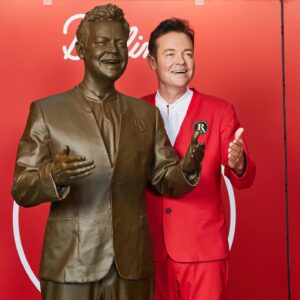 Stephen Mulhern Instagram - 🤩 To celebrate the launch of our restyled uniforms, we’ve created a life-sized statue of our very own former Redcoat and brand ambassador, @stephenmulhern! ⭐️ 

His doppelganger will eventually live at our Minehead resort, where his Redcoat journey began ❤️ 

#ReadyToButlins #Redcoats #StephenMulhern #Butlins