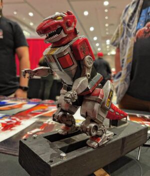 Steve Cardenas Instagram - What a treat!  VFX Supervisor @shickrick brought the ACTUAL RED TYRANNOZORD used in the running sequence by my table today!  Such history!! So happy to have had my part in it all…🙏🏼