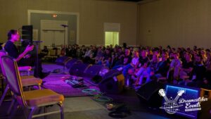 Steve Vai Instagram - This year’s Vai Academy Camp 7.0 was just off the hook fantastic. Totally sold out in advance and our biggest group so far. It’s so nice to be in an environment filled with guitar lovers that are eager to embrace the guitar culture, meet with so many other like minded people, thrive in an immersive experience and raise their own bar. Not to mention party time by the fire pit!
The nightly jam with the campers was the best. Perhaps 4 hours a night for 4 straight nights of meeting each one with a hot guitar strapped on them and presenting the band with a simple little riff that we would then explore. To musically respond with them in that intimate sacred musical sharing mind is what it’s all about. I love them all so much. 

I also noticed that we have many return campers, and so many people who have created bonds through these events with others. It’s more like a camping family these days.

And our list of guests this year revealed some of the most striking and technique elevated artists in our current times. Our special guests included Mohini Dey, Daniele Gottardo, Tim Henson, Scott LePage, Sarah Longfield, Marcin, Matteo Mancuso, Yvette Young and Jordan Rudess, and each of these inspired artists dazzled us with their unique and fascinating touch on the guitar. In Mohini’s case it was the bass. She is a phenom that is pushing forward what’s possible, as is our other guests. Being able to jam with the guests was another highlight. They inspired me beyond. 

My most sincere thanks to all the campers, clinicians and special guests that helped to make this year’s Vai Academy 7.0 such a memorable life experience. 
Now I’m looking forward to the next one! See you there.