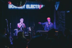 SuRie Instagram - All the feelings performing in New York this week. My current creative project has real poignancy on the East Coast, so it meant the world to share originals from Building A Woman in a place that has my heart for special reasons. I could not be more proud of @benedictcork smashing his US tour and grateful to join the magic for the final night, along with the effervescent @judyblankmusic. And to collaborate and perform with the beautiful human and talent @la.nskey makes this show such a special one for the memory books. Thank you, NY crowd for showing up and sharing your feelings! Floating round this fabulous city on cloud frickin’ nine. ✨ 

📸 @buscar_photo