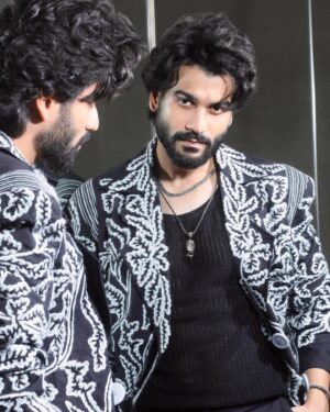 Sunny Kaushal Instagram - Taking a moment to reflect 
For #IIFARocks2023 

Styled by: @amandeepkaur87 
Photographs: @amey_ghatge 
Wearing: @twopointtwostudio 
Jewellery: @amamajewels @abhilasha_pret_jewelry