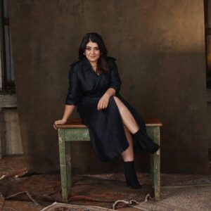Susie Youssef Instagram - Woman In Black On Table In Boots. It’s a working title. 
Episode 5 of Deadloch is out tomorrow on @primevideoaunz #deadloch 

📸 @brewbevanphoto