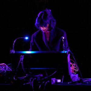 Suzanne Ciani Instagram - Chicago! On Friday, May 17, Suzanne Ciani brings her Particles & Waves Tour to your city, presented by immersive series Age of Reflections (@ageofreflections). 

Each night, Suzanne combines live Buchla improvisation with themes from Seven Waves, her dreamy 1984 solo LP. It’s alternately melodic, noisy, tranquil, and visceral… in other words, a breathtaking experience, presented in quadraphonic sound, paired with a projection-mapped light show. 

Tickets on sale now at our 🔗 in bio. 

⎐ CHICAGO 
Friday, May 17
Fourth Presbyterian Church
w/ Jeremiah Chiu
↳ presented with Empty Bottle

🌊🌊🌊🌊🌊🌊🌊 

📷: 1) Seven Waves-era Suzanne in her studio, 2) Suzanne live at Reflections by John Vogler, 3) album art, 4) tour flyer