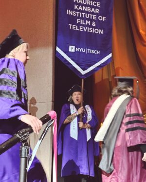 Tania Larsson Instagram - This is my love Razelle Benally graduating from NYU Tisch with her MFA this past month!

I’m extremely proud of her massive accomplishment not only did she survive the pendemic while in graduate school but she also had to work full time in two jobs as a writer on Dark Winds, and a director for the @showtime documentary series Murder in Big Horn while a full time student to be able to graduate.

She was nominated by her faculty with the honour to lead them during the salute ceremony as the banner bearer for the Maurice Kanbar Institute of Film and Television. She was also recognized in the speech of the president of her school during the ceremony and we screamed way too loud in joy when we heard her name out loud!

You can count on your fingers how many Indigenous people have graduated from this prestigious program and I’m so proud of her for honouring her gifts and working so hard for this accomplishment. I would also like to thank the faculty who saw her talents and pushed her to get even better!

Congratulations my love for graduating with the class of 2023 💜💜 #nyutisch #nyuclassof2023