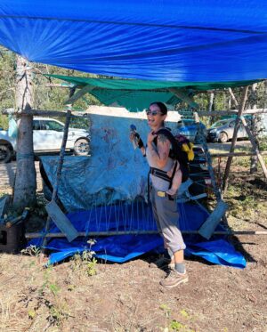 Tania Larsson Instagram - Had a wonderful week at the Mouse Camp outside of Fort Simpson tanning hides.

Qillu fleshed her hide with baby on her back sleeping soundly.
We helped Erin lace a large moosehide on a frame, and let it dry in the sun to be ready for scraping.
Ikajuut enjoying the shade in the bug tent.
Ethel’s hide all softened laced up on a frame blessed by a dragonfly.
Cathy scraping the water out of her hide so she can twist it.
Baby Ikajuut sleeping in his swing while Qillulaaq and Celine scrape her moosehide hide.
Earl monitoring camp after a bear stopped by to check it out.
Enjoying the sunset after a long hot day working on hides.

#moosehidetanning #denenahjo #liidliikuefirstnations