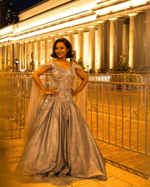 Tannishtha Chatterjee Instagram - Film @yellowbusfilm at @tiff_net arriving for another screening in a gown with starry silver hues. The finest silver foil on silk Lycra and meticulous hand embroidery by expert karigers using cutdana , sequins Rhinestones.
@meenakshi.creations by @whosunnykapoor #TIFF2023 #meenakshicreations #chandnichowk  With my rock star Oscar winning co producer @guneetmonga  and @whosunnykapoor the designer of this beautiful gown