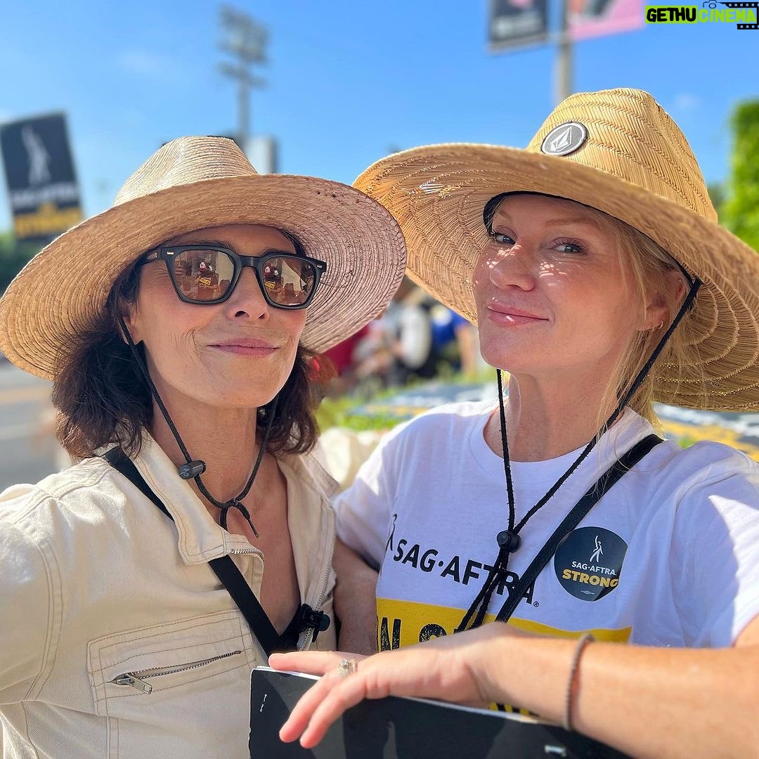 Tara Buck - 3 Likes - Stay unified ✊ Bright side of strike☀️ marching alongside friends and colleagues, bumping hat brims and sharing sunscreen. Our spirits are high and our determination is unwavering. Here with the brilliant @iammichelleforbes on the line. Friend, you are as solid as a rock. #sagaftrastrong #sagaftrastrike #unionstrong @sagaftra