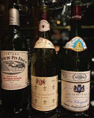Tara Buck Instagram - Last night’s offerings. 🍷
This special line up had everyone on the edge of their seats, as you can imagine, with the most anticipation for the Grands Echézeaux 1966 Domaine Henry Lamarche.  Turns out, this wine has seen better days but her presence alone elevated the evening. 

It was in fact, the 1990 Paul Jaboulet Aine, La Chapelle Hermitage that ended up shining the brightest.  She sauntered in like a weathered stage veteran, dripping in tobacco and herbs while simultaneously revealing a deep well of dark, nuanced fruit.  She effortlessly took center stage and refused to leave until the audience was on its feet begging for more.  This time Rhône stole the show.