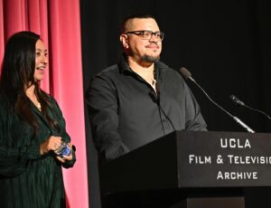 Tazbah Chavez Instagram - 11/4 — Thank you @uclaaisc x @uclaftvarchive for bringing @sterlinharjo and I out to screen @rezdogsfx episodes. As a UCLA alum, it meant a lot to screen our work there. I used to stand at the top of Janss steps and wonder how I was going to make an impact on the world, like ucla makes you believe you can. I would have never dreamt it would be through telling Rez stories with my brother, Sterlin — who I once drank 40s with and read poems to near campus at a time we were both feeling like outsiders in a place like LA. This was one of many full circle moments I had during Native American Heritage Month. What an honor to be blanketed on that stage 🩵💛thank you to @drdavidshorter for moderating a thoughtful conversation and an extra special thank you to @tachiiniiphotography for gifting us with feathers 🥹 appreciate you and all the work you do for the community.