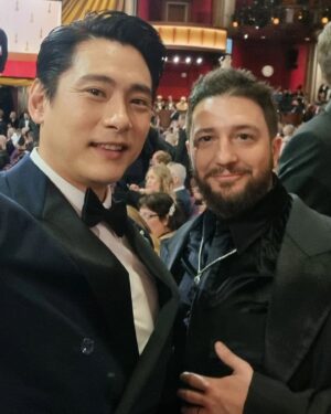Teo Yoo Instagram - Thank you for this incredible experience @theacademy
Custom suit by @louisvuitton  Brooch & Watch & Rings by @cartier
