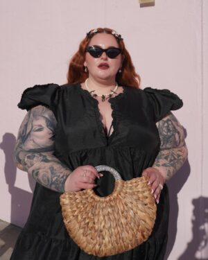 Tess Holliday Instagram - When I founded @effyourbeautystandards 10 years ago, I didn’t think about what it would be like to approach 40, nor how my body and the industry would evolve. I was a bit naive, brimming with excitement and hope for a world where I could truly love myself. It’s easy to love the person you see in the mirror when you’re younger, constantly working, carefree (well, mostly), and frequently getting boosts of serotonin. But what happens when the industry you love changes, when life takes its toll, and your body no longer looks the way you remember? How do you love yourself then? When it’s quiet and you’re forced to sit with who you really are, does that love, or even like, still flow?

For the last year I’ve been really struggling with going out in public and being public facing. I found myself internalizing work looking a little different and equating that to not being worthy. I had to confront many insecurities and anxieties head-on. So many times, I caught the negative self-talk getting louder in my head and I let it take the driver’s seat. 

Everything changed a few weeks ago when I woke up one morning and thought, “What the f*** are you doing?!” I’ve been in difficult spots before, and the only way out is through. Does my life look a little different than I imagined? Yes. Does that mean it’s bad? Absolutely not. The pressure (self-induced) pushed me to get creative and make a lot of changes. It turns out, this doesn’t make me a failure; it makes me human. 

I’m so grateful to so many of you who have been on this journey with me, the ups and downs, calling me in, the love, all of it. Also, shout out to *Inside Out 2* for messing me up this last week—wrecked me! Wherever you’re at in life, whatever you’re dealing with, big or small, keep getting up, keep fighting, and don’t listen to your anxiety. Don’t let it rob you of moments with your loved ones, your community and more importantly YOURSELF. Don’t let it win. Honestly, it’s a brat girl summer, so tell it to STFU. You don’t have to love yourself to succeed, you just have to try and be a little delusional. I love you, and I love me too. #effyourbeautystandards