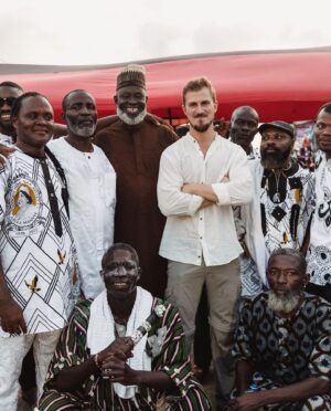 Thomas Brag Instagram - First trip to West Africa 🌍 my 60th country and an enlightening experience as we searched to understand the funerals of Ghana 🇬🇭 

Complex, filled with grief but also dance, music and celebration my friend Svenja from @storiesmatter told me a year ago about the “happiest funerals in the world”. One year later we arrived to find their story.

Within a day we ended up in a Royal Funeral of a “Queen Mother”. I felt welcomed despite the sensitive circumstances and sensed a genuine desire to connect from so many locals. Many asking if we could stay friends.

The first picture is with a local Chief named Moro. At first I was intimidated from far away by the leader energy he was commanding. I eventually went up to shake his hand and he turned out to be immensely kind and eager to tell me about his culture. We spoke for about 30 minutes and danced.

Grateful that the stories continue to find us and to be given the ability to do what I do.

As we approach the end of 2022 and the thought of turning 30 next year is very much present in my mind, I’ve felt myself sinking more and more into a reflective headspace. Many lessons to digest, deeply transformative moments to absorb and a new decade to define.

But for now, a few more adventures left for 2022. Towards Central Africa we go… Can you guess which country? 🤲

📸 by @storiesmatter