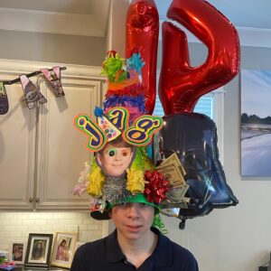 Tiffany Fallon Instagram - Jagger humoring me with a picture for his birthday! I 💙 you @jagger_rooney and I’m proud to be your #mom #birthdayhattradition #14 #myfirstborn #bighat 🎉 #hotgluegunburns for the birthday win #2008