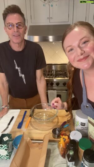 Tim Daly Instagram - ✨HUMANS!✨ We made Chocolate Peanut Butter Protein Bars LIVE on instagram today!!

🍫Watch to learn this amazingly simple, delicious and nutritious recipe and hear some fun stories along the way!

INGREDIENTS:
3/4 creamy peanut butter
1/4 cup honey
1 Tbsp coconut oil, melted 
1 tsp vanilla 
1/3 cup ground flax seed 
1/2 cup plain collagen peptides powder 

For topping:
1/3 cup Lily’s chocolate chips   1 tsp coconut oil (for melting, topping)

INSTRUCTIONS:

Combine all ingredients except chocolate chips in a large mixing bowl. 
Will create a cookie dough like batter. Lay the batter into the base of a parchment lined 5x9 bread tin. Microwave the chocolate chips   coco oil in 30 second intervals until melted. Pour over the top of the pb layer and refrigerate/ freeze for one hour. Slice into 16 equal pieces and enjoy! 

#easyrecipeideas #homemadeproteinbars #chocolatepeanutbutter #fatherdaughter #cookingshow