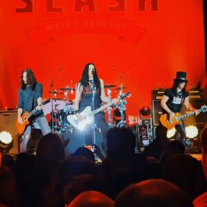 Todd Kerns Instagram - Not sure where this was but it was fun. Keeping Lemmy’s memory alive every night on tour. All of this in my ‘68 Comebacks Special Elvis shirt. The weekend is finally here. I hope you have an awesome one. I’m deep in preparation for an upcoming surprise appearance across the pond (stay tuned). Plus @heroesandmonstersband and @toquerocks preparations for this summer. Life is good. Life is busy. Very busy but that’s a good thing. Some day I’ll be lying around feeling justified. In the meantime there’s rock to be done. Have an amazing weekend! Happy Friday! #smkc #slash #brentfitz #franksidoris #lemmy #lemmykilmister #lemmykilmister♠️ #lemmyforever