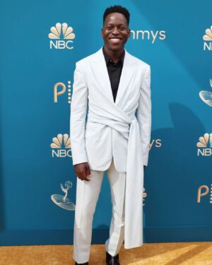 Toheeb Jimoh Instagram - Emmys 2022 💫

I'm so proud of my TedLasso family! Yesterday was 🤯🤯

Suit: @dior
Styling: @ysmnsabri 
MUA: @chousner 
Hair: @theshaveplace 

#Emmys2022 #toheebjimoh #Samobisanya #tedlasso