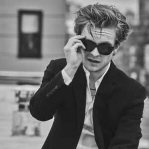 Tom Glynn-Carney Instagram - There’s just something to be said about a guy on a massive throne with a shiny crown atop his head.

But while 29-year-old Tom-Glynn Carney is still getting used to life as the king Aegon II Targaryen on HBO’s #HouseoftheDragon, he’s got way more in his arsenal than dragon riding and battle prepping—and it might just surprise you.

In the midst of season 2 (streaming now), Carney spoke to us about his very special set of skills, comparing the show to real-life current events, and other projects on the horizon outside of the fantastical land of Westeros.

📸: @guyaroch