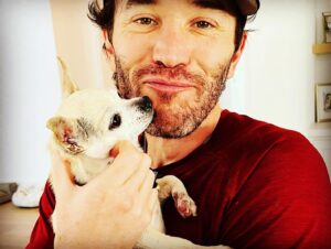 Tom Pelphrey Instagram - Heavy heart today.  We had to say goodbye to one of our pack.  DUMP TRUCK aka Dumpy was kind of a legend.  He ignored me for the first six months I knew him.  But slowly, he let me carry him.  Pet him.  Give him 2nd dinner.  Give him 3rd dinner.  He would stay up late with me and we would do midnight snack.  And by the end he was my guy- and he let me hold him and cuddle him and he always gave me kisses.  He really was a special dog.  What he lacked in size he more than made up for in personality.  And in a house FULL of personality- Dumpy was 👑. @kaleycuoco ♥️♥️♥️♥️♥️