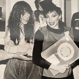 Toni Basil Instagram - Come join me at the Grammy Museums celebration of the 40th anniversary of my 1984 Billboard #1 hit song “Hey Mickey “and my 1984 longform video “ Word of Mouth “Grammy nomination . 
Its This Wednesday evening January 11 in the theater at the museum for a two hour retrospective of my career with Q&A hosted by Tina Malave .800 West Olympic Blvd.
Pictured is Duran Duran and myself February 28, 1984 at the 26th annual Grammy’s
The nominees in the video category were the Rolling Stones ,Grace Jones , Olivia Newton-John , and the winners Duran Duran .Yes  I was very flattered to be part of that group!
Other pictures 
Holding my Hey Mickey gold record with my good friend singer, artist and brilliant songwriter of “Boogie Wonderland “ with Earth Wind and Fire and the “Friends Theme “ amongst a multitude of other songs is Allie Willis .
Line drawing portrait on the Billboard chart is by Donfeld, Oscar-nominated Hollywood costume designer.

 #grammymuseum #tonibasil #mickey #heymickey #1960s #1970s #1980s #80s #music #dance #choreography #thelockers #losangeles #80icon #popculture #director #wordofmouth #longformvideo #grammynominated #numberonesong