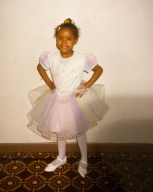 Toya Turner Instagram - Unfortunately my family lost a lot of memories in a fire years ago, but sometimes my aunt surprises me with little gems like this. Her and I were at a wedding and everybody was getting their picture taken so I ran up to her tugging on her blue dress “ Take MY picture auntie! Take MY picture!” 

 📸 : Auntie Kim 
 
#wedding #jamaican #throwbackthursday #throwback #jamaicangirl #memories #family #pose