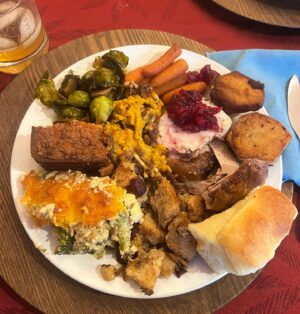 Travis McElroy Instagram - Turkey, cranberry lime jelly, Parker house rolls, Brussels sprouts, caramelized carrots, cheesy broccoli casserole, corn pudding, sweet potato casserole and fondant potatoes made by me. Mashed potatoes, dressing, gravy made by guests.
