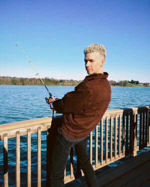 Travis Mills Instagram - sorry i missed your call i was on the other line 🎣