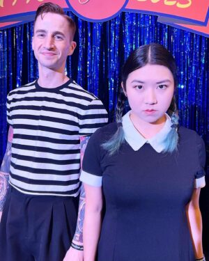 Tricia Fukuhara Instagram - “Are you Wednesday?”
“No… I’m Thursday.” 😐

#boooooo

#camphollywood #wednesdayandpugsley #lindyhop #camphollywood25 #lindygroove