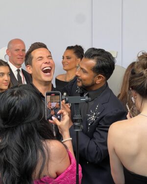Utkarsh Ambudkar Instagram - 77th annual @thetonyawards aka Date Night with @hibiskisss 

the absolute BEST show on earth. Huge hug to @juleshough for letting me co-host with you. 

thanks @plutotv @cbstv 

styled by: @johntanstyling 
grooming: @chelseagehr 🤎🤎
HairCut: @matthewstylist 

super dope red carpet tuxedo by @_demo_official by DEREK CHAN
Shirt by @prada 
Bow-tie by @titleofwork 
Fancy a$$ Ring and watch by @officialfaberge 
Boots by @carlossantosshoes 

Act ONE look: 
shiny shoulder tux by @philippplein 
Shirt by @hugo_official 
Bow-tie by @titleofwork 
Ring and watch once again @officialfaberge 
Loafers —- stylist’s archives 

broadway is the best place on earth.